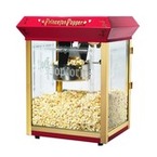 Red Popcorn Popping Machine  that makes tasty golden yellow goodness for kids parties in Atlanta