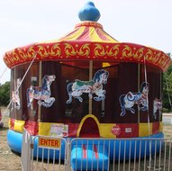 Carousel Bounce House with horses and inflatable in McDonough GA